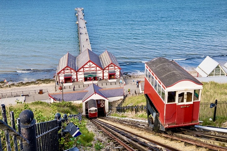 Saltburn cliff lift descending towards the pier and sea